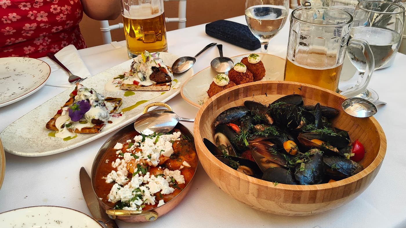 Spread of Greek dishes on the table