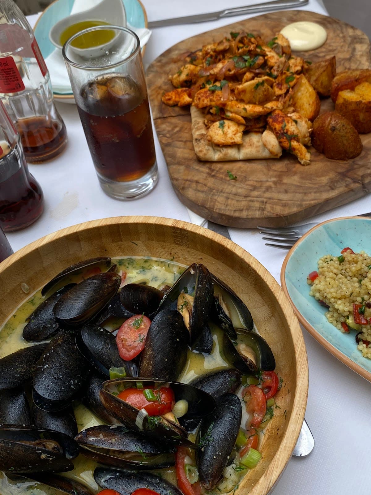 Mussels, chicken skewers and couscous spread